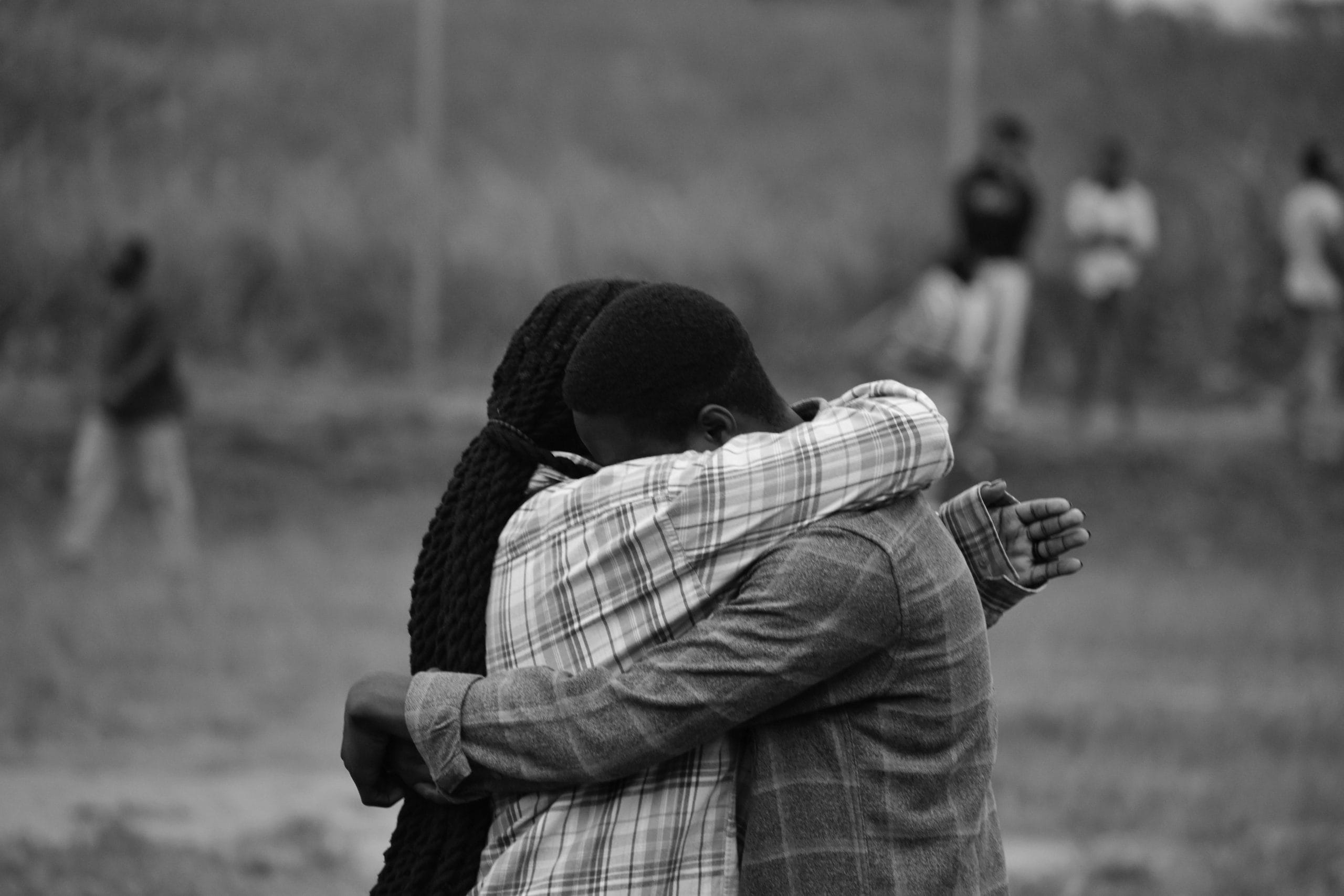 Two people hugging